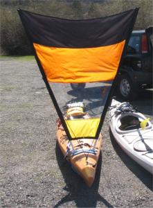 Sea kayak with home made downwind sail